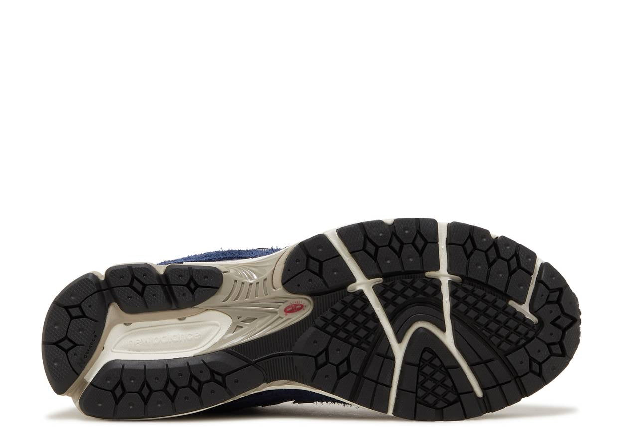 New Balance 2002R
Protection Pack Navy Grey